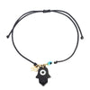 Black String Bracelet with Mother Of Pearl Eye And Hamsa Hand Charms